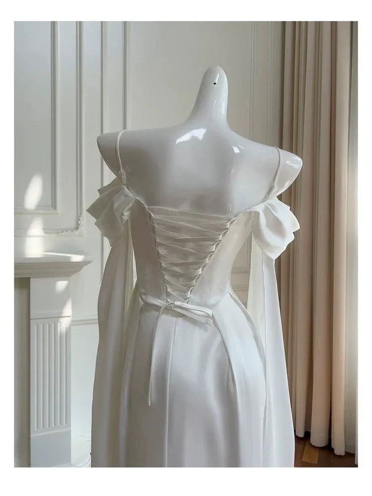 Elegant Mermaid Off-shoulder Long-sleeve Corset-back White Satin Floor-length Prom Dress.