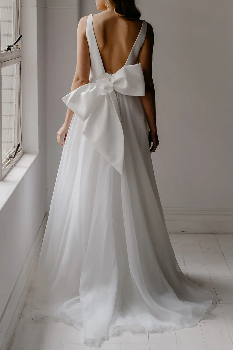Ethereal A-Line Plunge V Neck Sleeveless Bow Back Train Length Wedding Dress