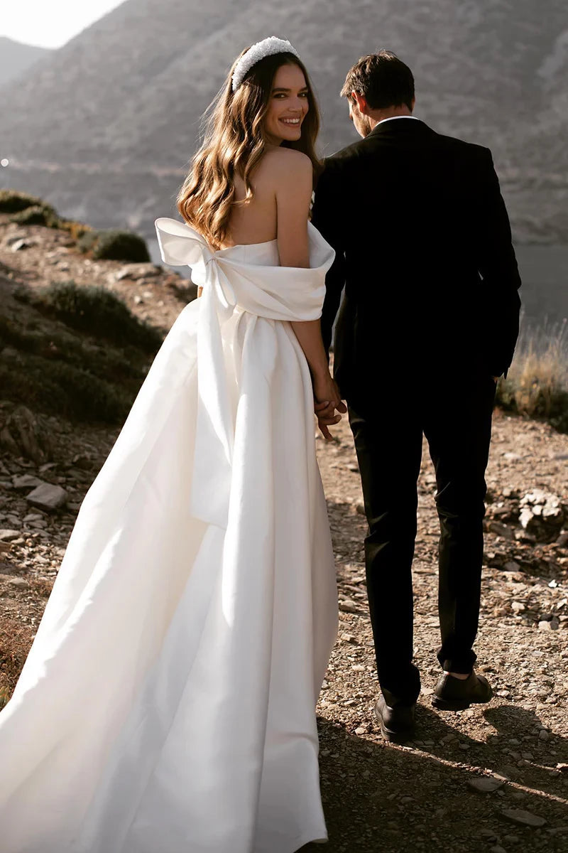 Minimalist Ball Gown Off Shoulder Strapless Bow Back Train Length Wedding Dress