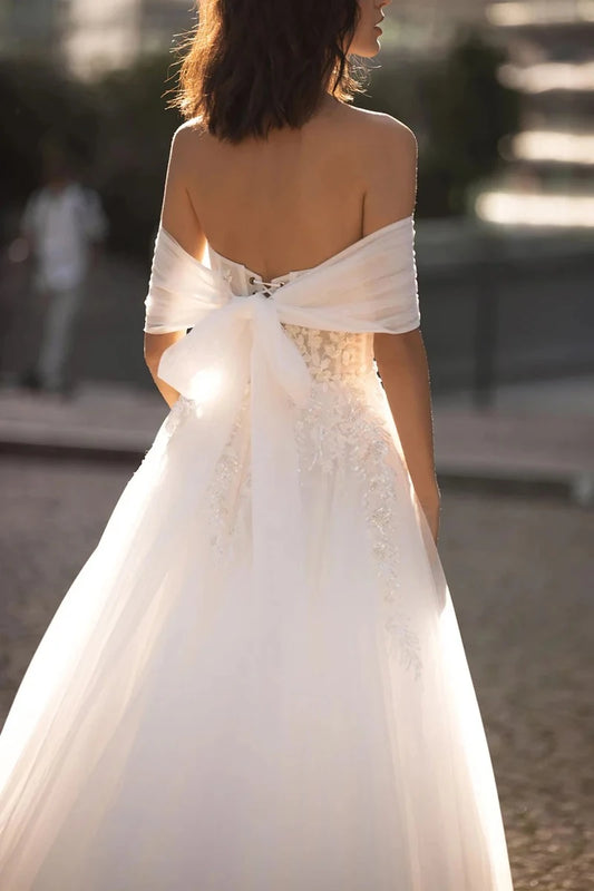 Romantic Ball Gown Off Shoulder Sleeveless Bow Back Train Length Wedding Dress