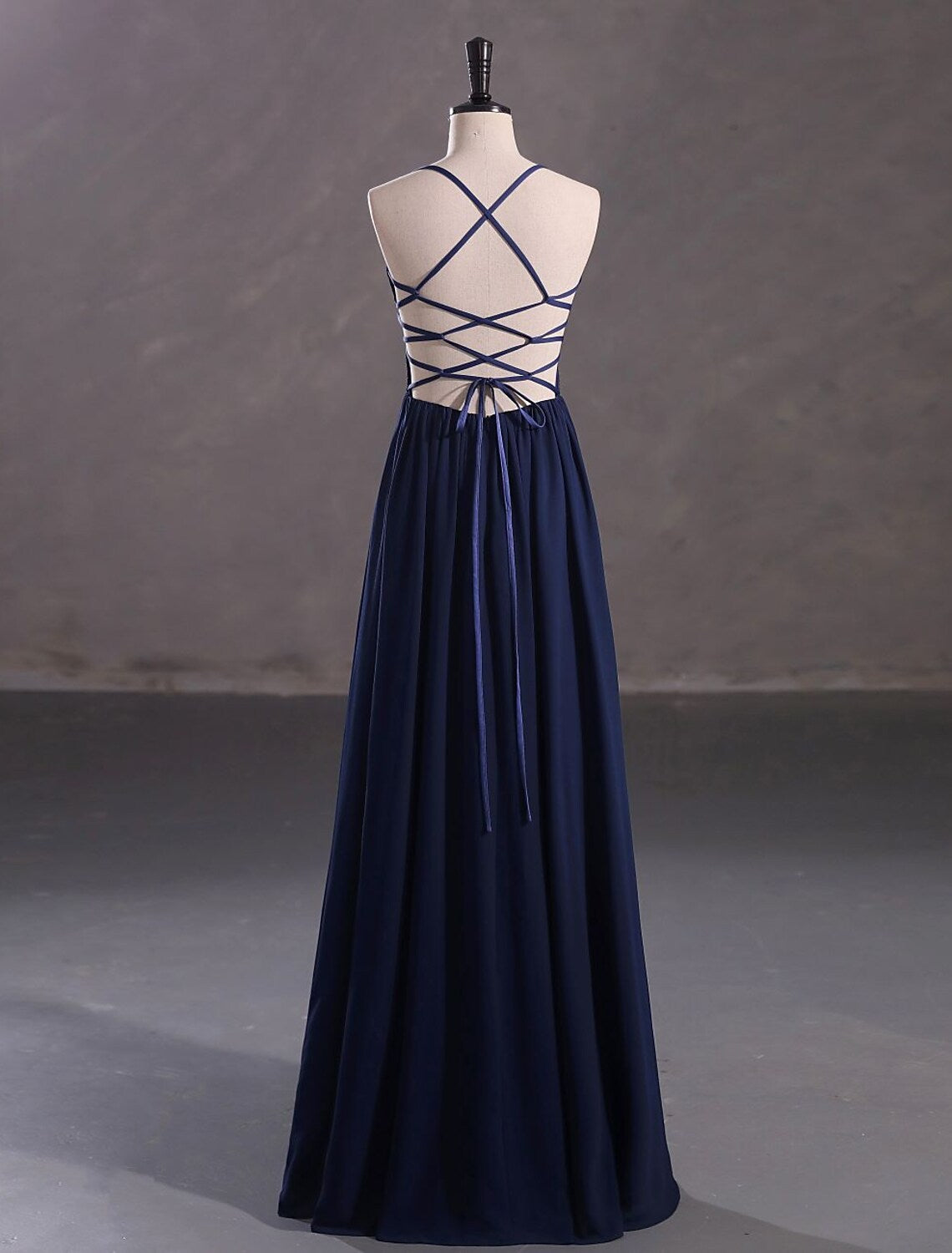 Full view of the elegant A-Line spaghetti strap gown.