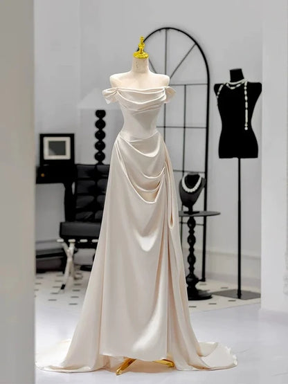 Elegant A-line Off Shoulder Short Sleeve Zip Back Train Wedding Gown