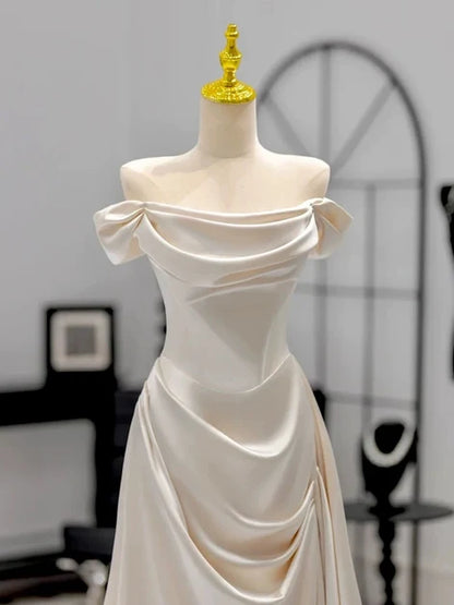 Elegant A-line Off Shoulder Short Sleeve Zip Back Train Wedding Gown