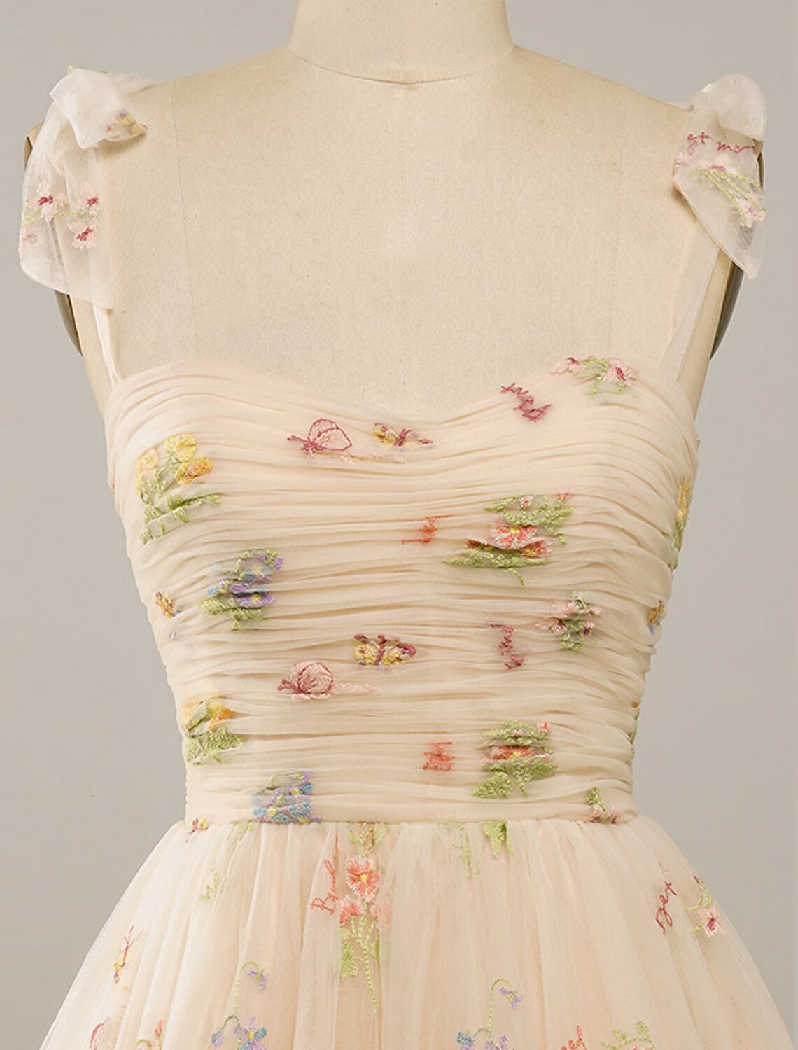 Back view of the A-line spaghetti strap short mini homecoming dress.