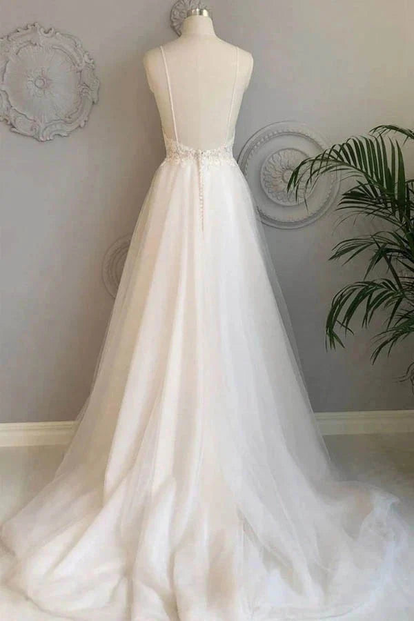 Back view of A-Line lace wedding dress showing court train and button details.