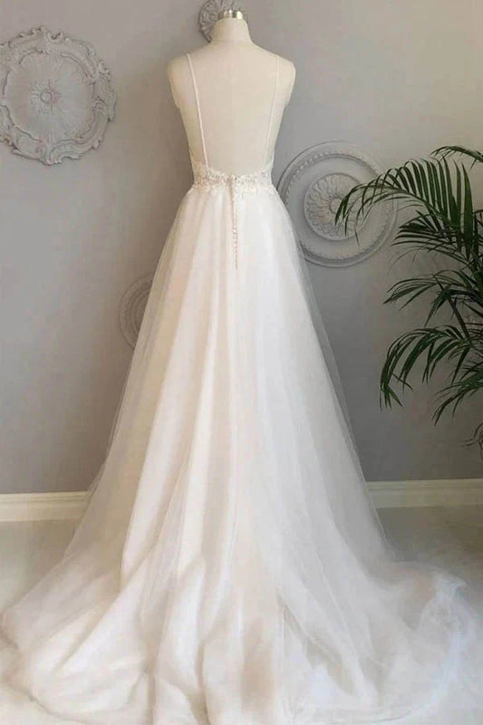 Back view of A-Line lace wedding dress showing court train and button details.