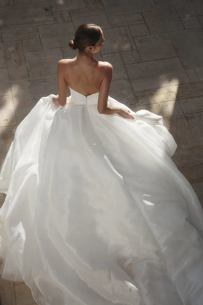 Dramatic Ball Gown Sweetheart Strapless Open Back Train Length Wedding Dress