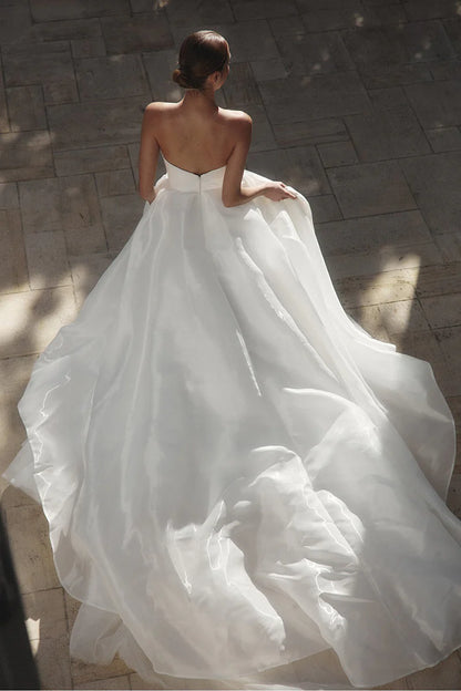 Dramatic Ball Gown Sweetheart Strapless Open Back Train Length Wedding Dress