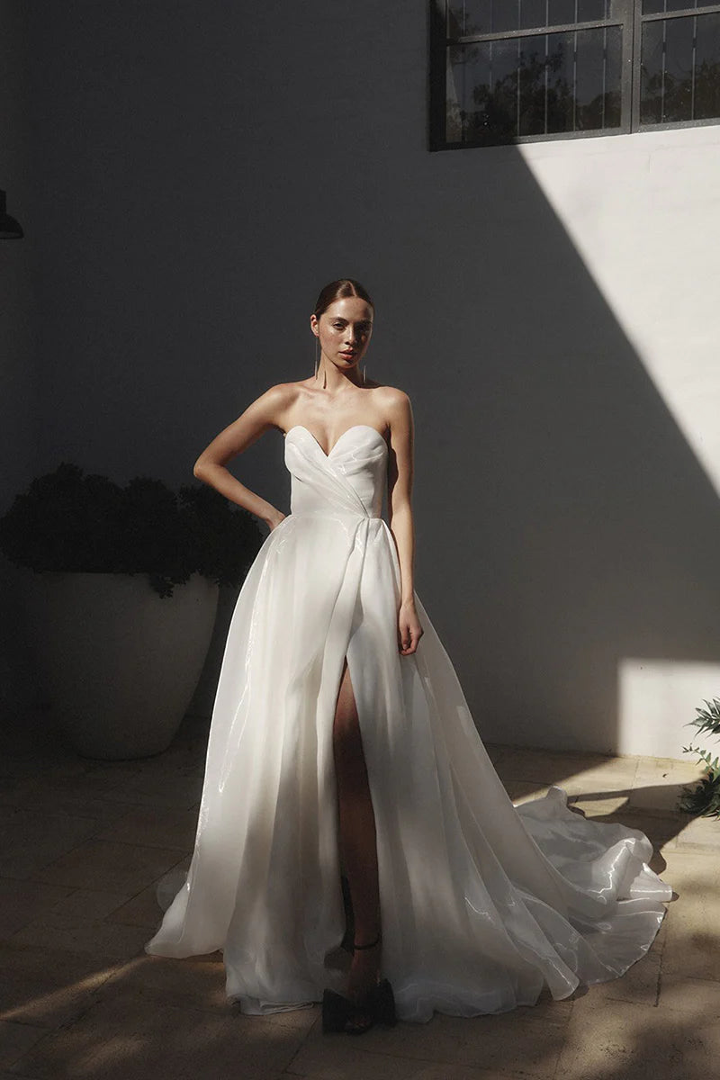 Dramatic Ball Gown Sweetheart Strapless Open Back Train Length Wedding Dress