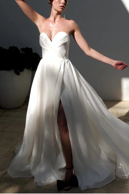 Dramatic Ball Gown Sweetheart Strapless Open Back Train Length Wedding Dress