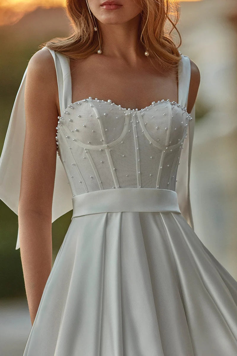 Elegant Ball-Gown Sweetheart Bow-Strap Open-Back Train-Length Wedding Dress