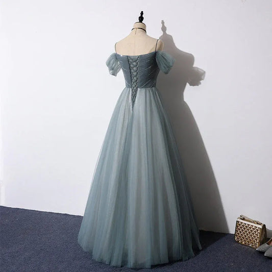 Elegant Dusty Blue Off-Shoulder Beaded Lace-Up Tulle A-Line Prom Gown.
