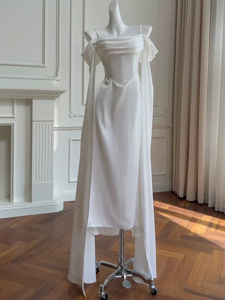 Elegant Mermaid Off-shoulder Long-sleeve Corset-back White Satin Floor-length Prom Dress.
