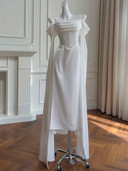 Elegant Mermaid Off-shoulder Long-sleeve Corset-back White Satin Floor-length Prom Dress.