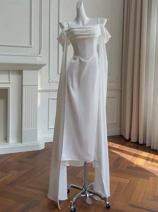 Elegant Mermaid Off-shoulder Long-sleeve Corset-back White Satin Floor-length Prom Dress.