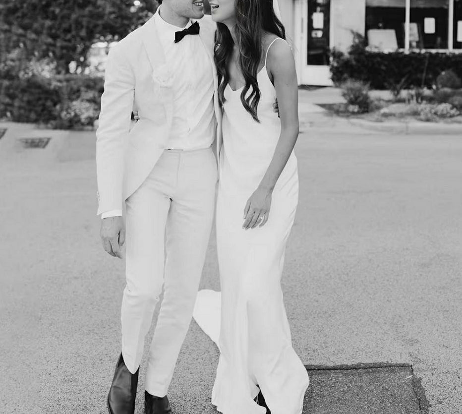 Elegant Mermaid V-Neck Spaghetti Strap Open Back Wedding Dress with Pearls.