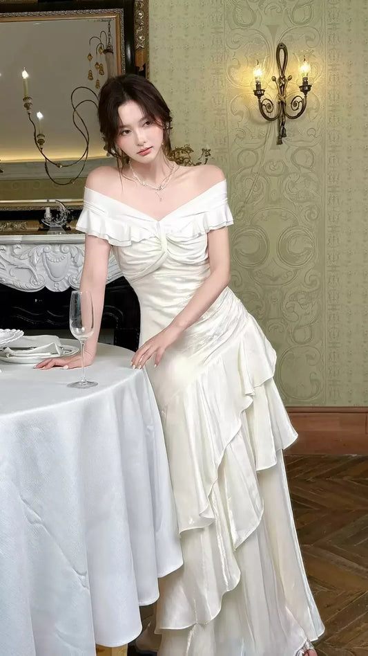 Elegant White Off-Shoulder Ruched Ruffle Satin Mermaid Prom Dress.