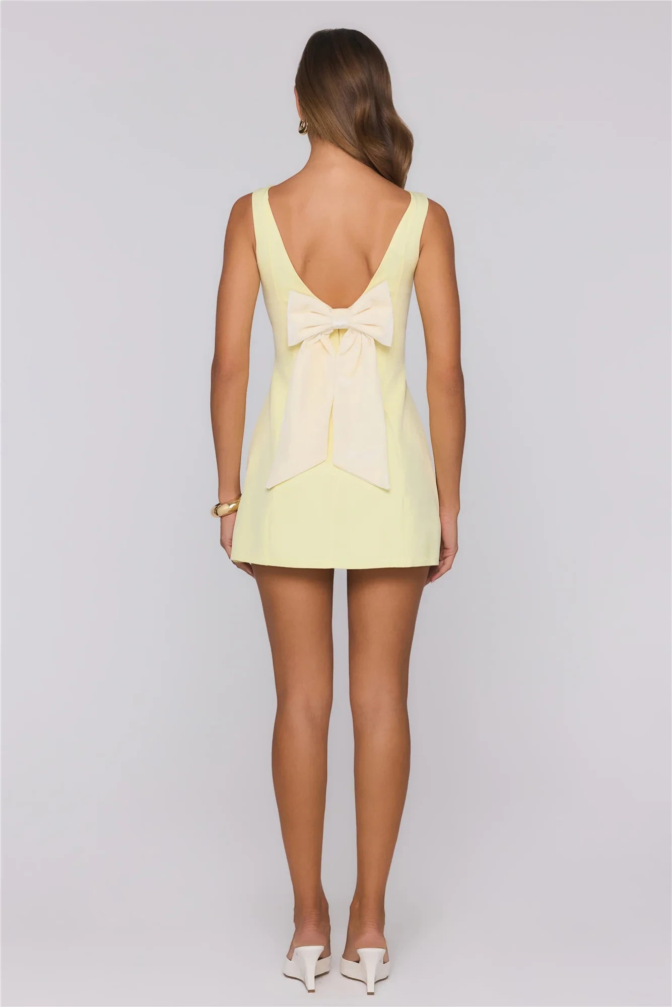Elegant A-line Boat Neck Sleeveless Open Back Mini Homecoming Dresses with Bow Detail