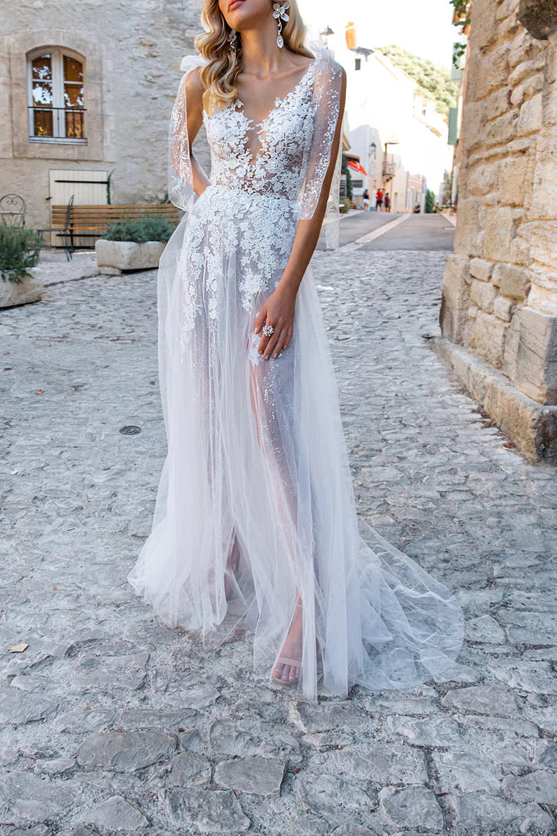 Ethereal A-Line Plunge V Neck Sheer Sleeve Lace Back Train Length Wedding Dress