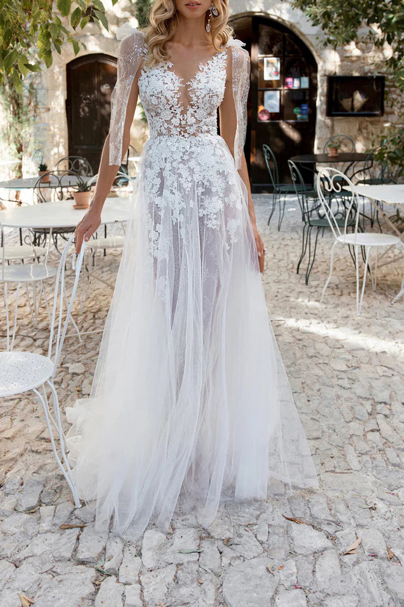 Ethereal A-Line Plunge V Neck Sheer Sleeve Lace Back Train Length Wedding Dress