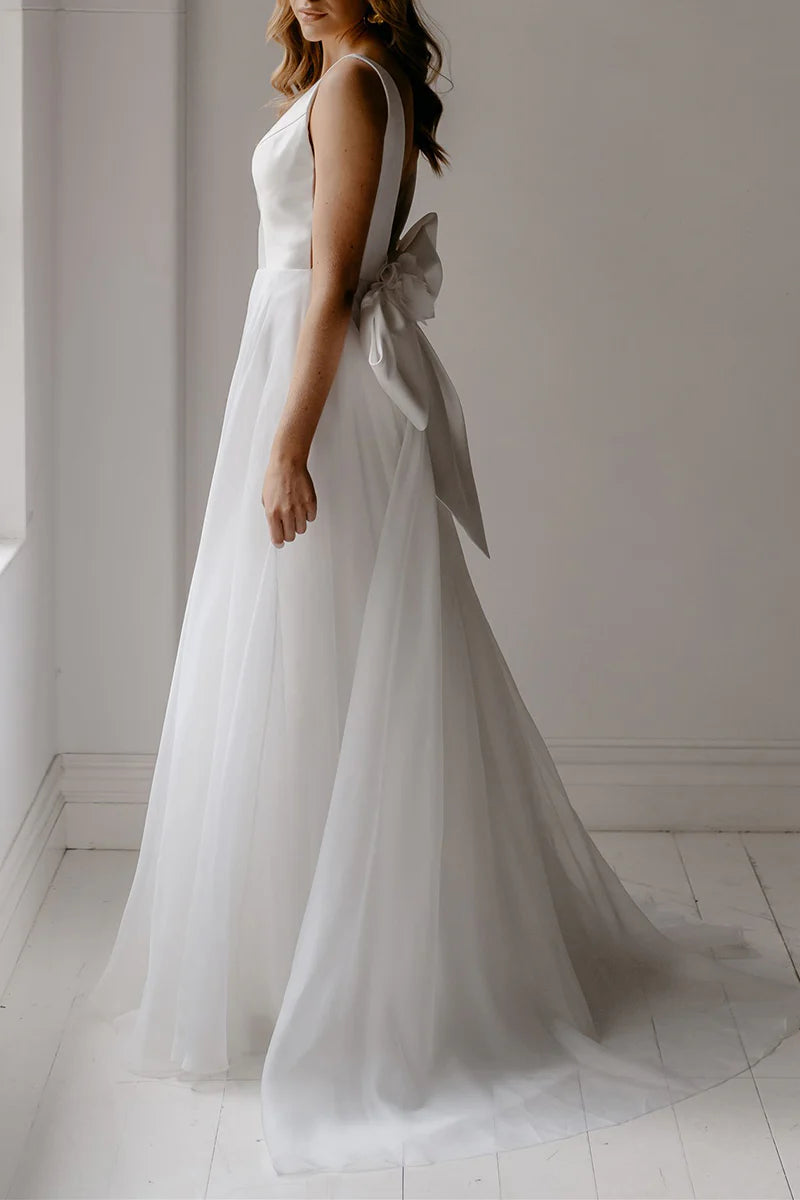 Ethereal A-Line Plunge V Neck Sleeveless Bow Back Train Length Wedding Dress