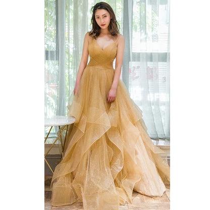 Champagne Spaghetti Strap V Neck Ruffled Glitter Tulle A Line Prom Dress