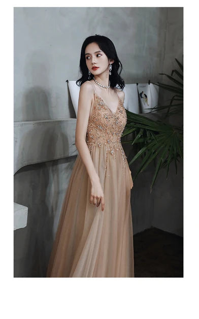Champagne Spaghetti Strap V Neck Beaded Tulle A Line Prom Dress