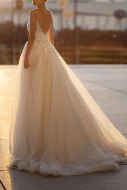 Romantic Ball Gown Plunge V-Neck Spaghetti Strap Open Back Train Length Wedding Dress