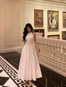 Ivory Satin A Line Halter Open Back Ankle Length Dress Front View - Aabei Dress