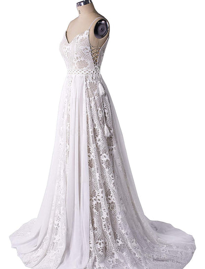 Back view of elegant A-Line wedding gown, showcasing the graceful court train.