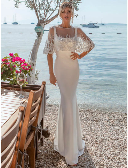 Casual beach mermaid wedding dress with open back, square neck, and satin beading.