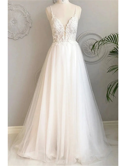 Chic A-Line spaghetti strap lace beach wedding dress with court train.