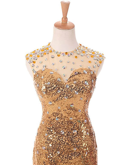 Elegant sequined and beaded mermaid trumpet prom dress with a jewel neck and court train.