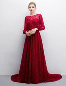 Elegant A-line boat neck long sleeve lace evening gown with sweep train.