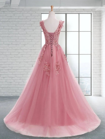 Back view of an A-Line prom dress showing the graceful sweep train.