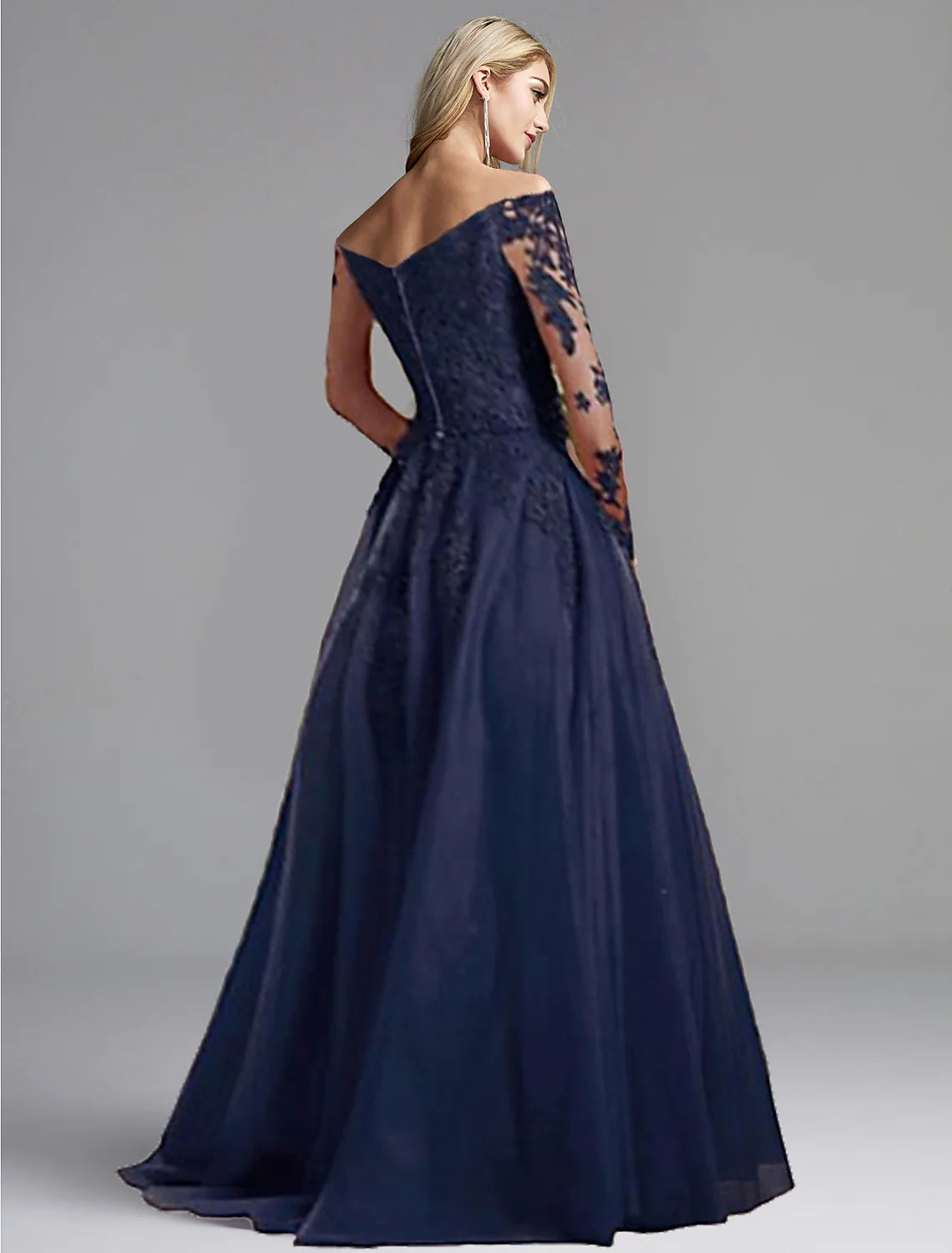 Back view of an elegant A-Line chiffon evening gown featuring an open back and appliques.