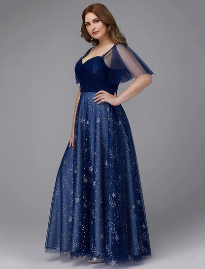 Back view of A-Line plus size prom gown showing lace-up detail.