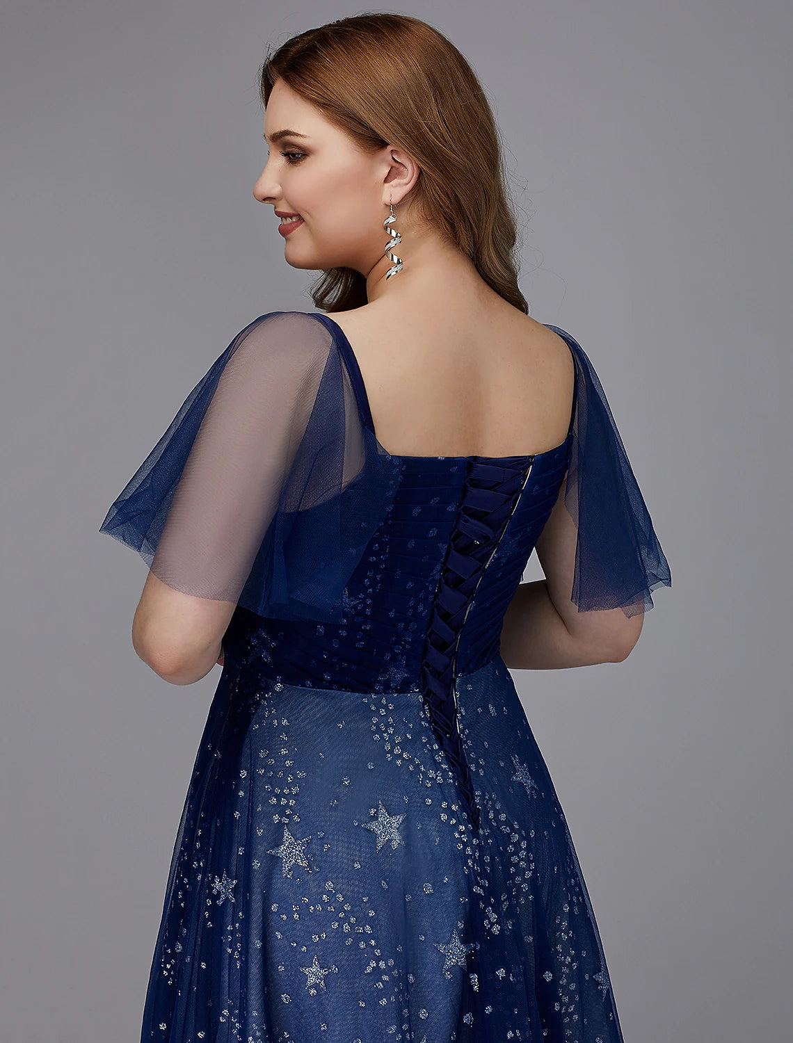 Full view of A-Line plus size tulle prom gown.