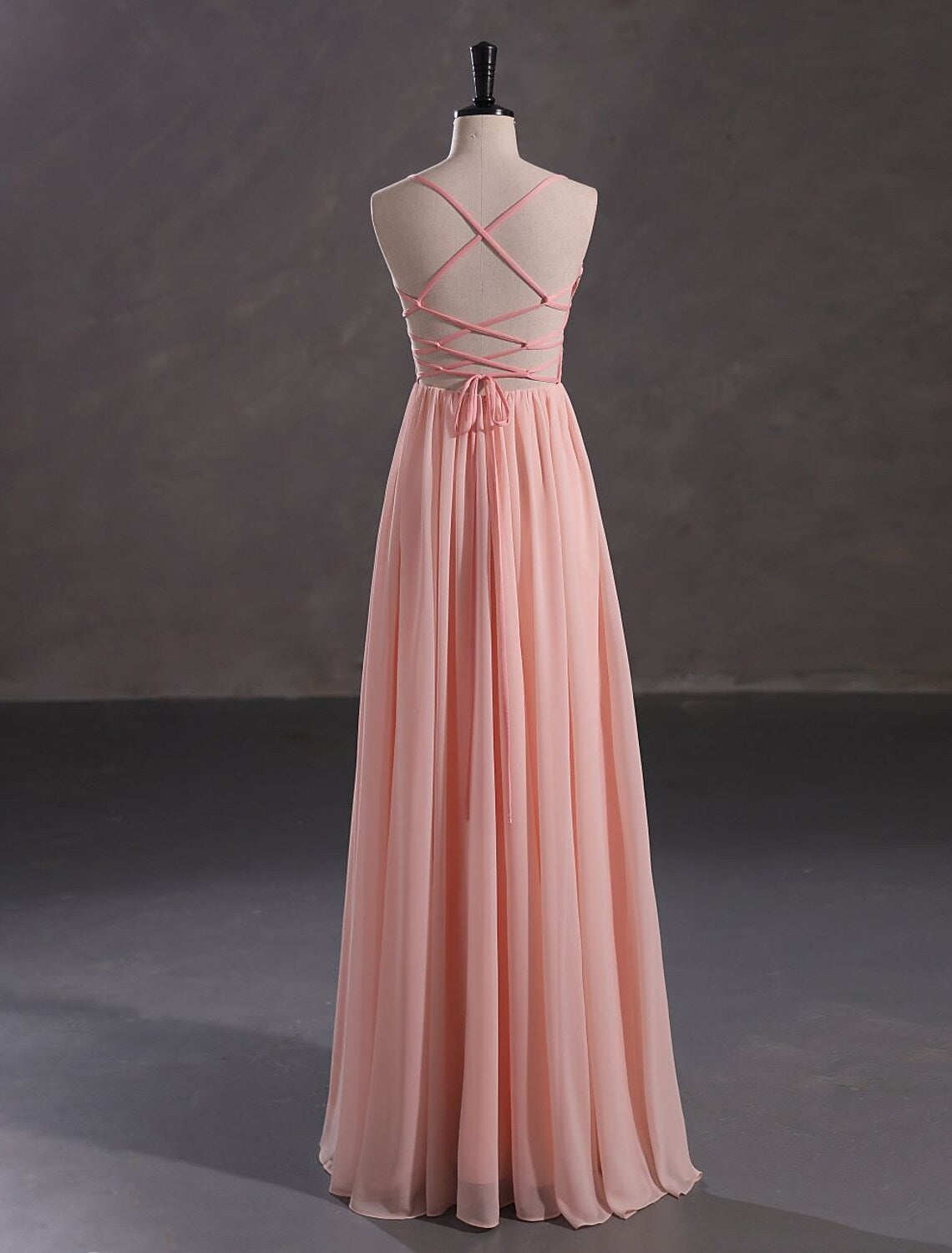 Elegant A-Line evening gown with crisscross back detail.