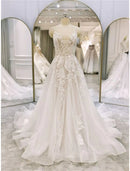 Elegant A-Line Spaghetti Strap Lace Ruffled Ivory Chapel Train Wedding Dress.