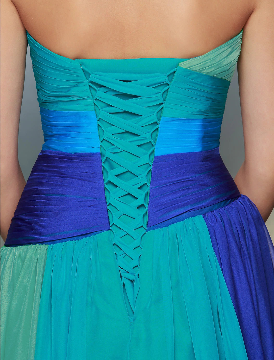 Back view of the elegant A-Line color block chiffon dress, showing backless design.