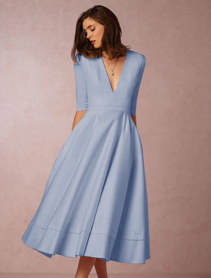 Elegant A-Line V-Neck Half Sleeve Pleated Pocket Tea Length Party Dress.