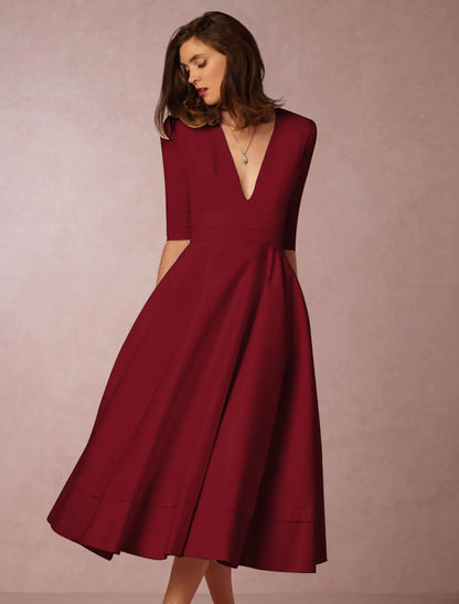 Elegant A-Line V-Neck Half Sleeve Pleated Pocket Tea Length Party Dress.