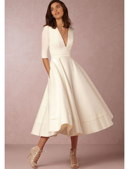 Elegant A-Line V-Neck Half Sleeve Pleated Pocket Tea Length Party Dress.