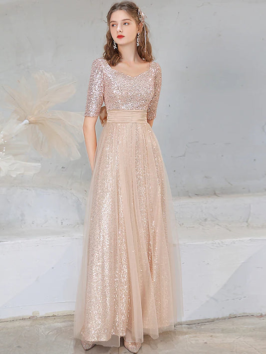 Elegant A-line V-neck half sleeve sequined evening gown with bow detail.