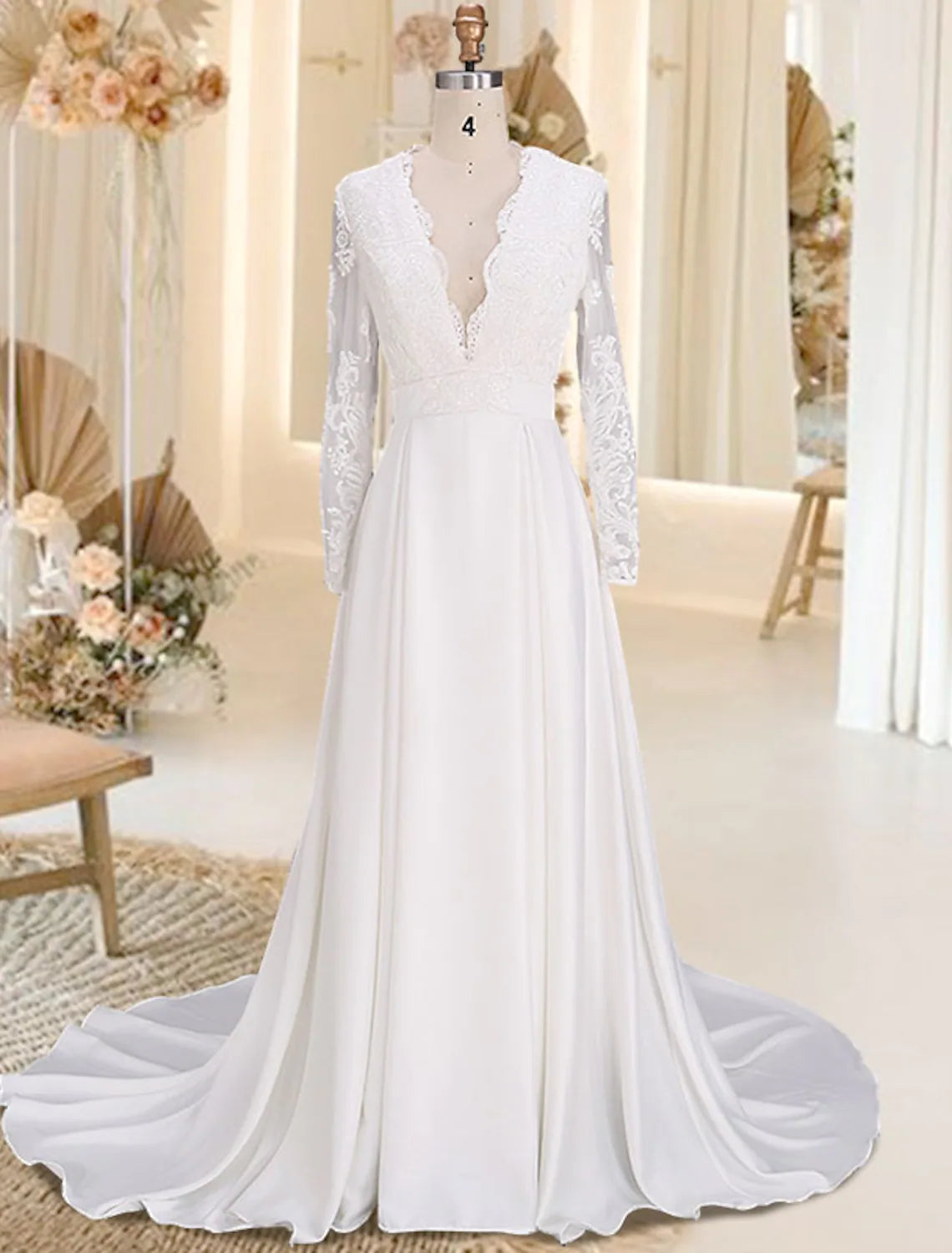 Front view of elegant A-Line V-Neck long sleeve satin wedding dress with appliques.