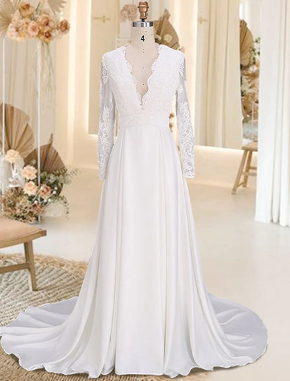 Front view of elegant A-Line V-Neck long sleeve satin wedding dress with appliques.