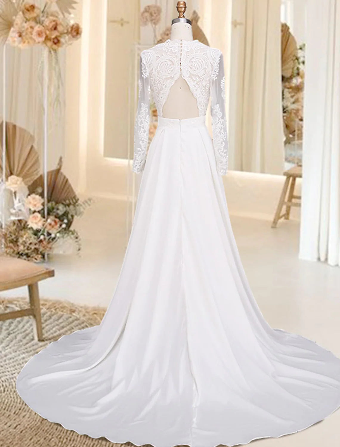 Back view of A-Line satin wedding dress, featuring open back and court train.