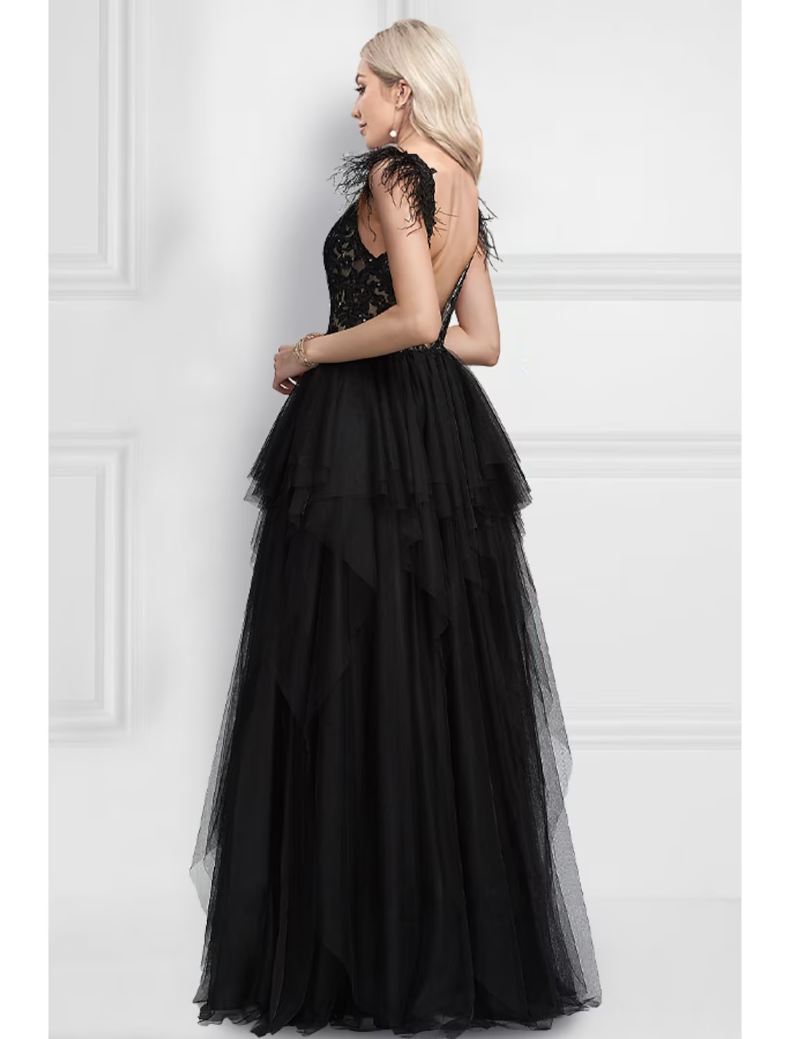 Full view of elegant black floor-length A-Line prom dress.