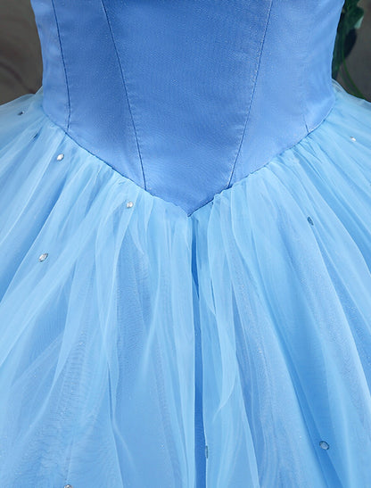Close-up of the off-shoulder bodice and delicate appliques on a satin ball gown.